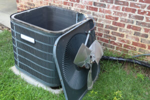 AC condenser unit fan removed for maintenance